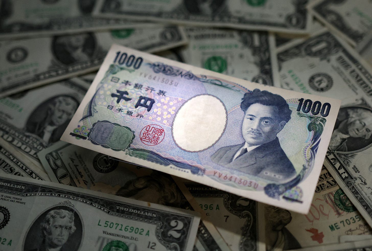 Japanese yen surges, ringing intervention alarm bells | Reuters