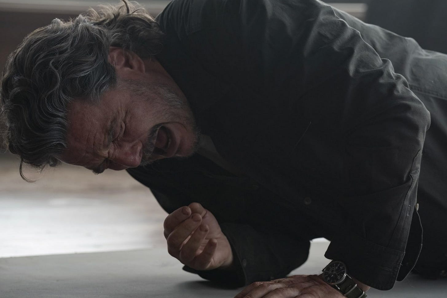 Pedro Pascal, portraying Joel in The Last of US, cries out in agony / HBO