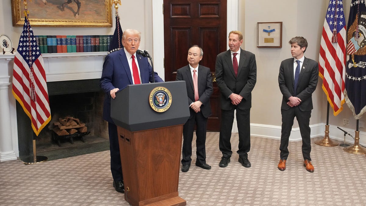 U.S. President Donald Trump speaks in the Roosevelt Room of the White House while SoftBank CEO Masayoshi Son, Oracle CTO Larry Ellison, and OpenAI CEO Sam Altman look on on January 21, 2025 in Washington, DC.