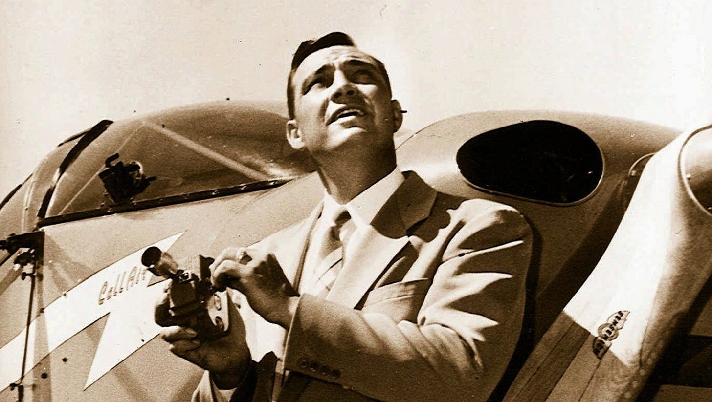 In this 1947, file photo, Kenneth Arnold, holds a movie camera in front of his CallAir, after he reported seeing nine alleged UFOs near Mount Rainier, Wash. Arnold had no idea he would change the world when he told reporters in Pendleton he saw nine strange objects flying along the Cascades. But 70 years ago June 25, that’s what he did.