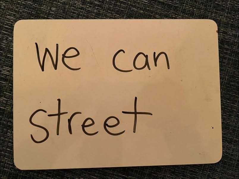 May be an image of street and text