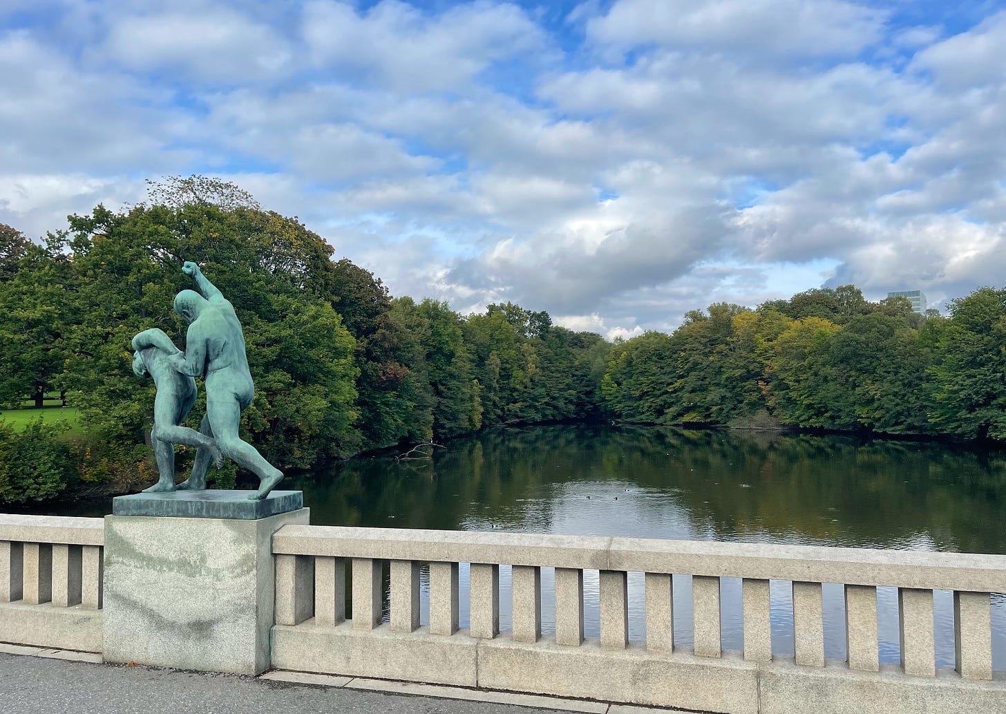 statue on bridge in park