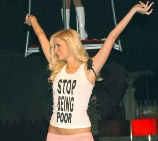 Paris Hilton in the "STOP BEING POOR" tank.