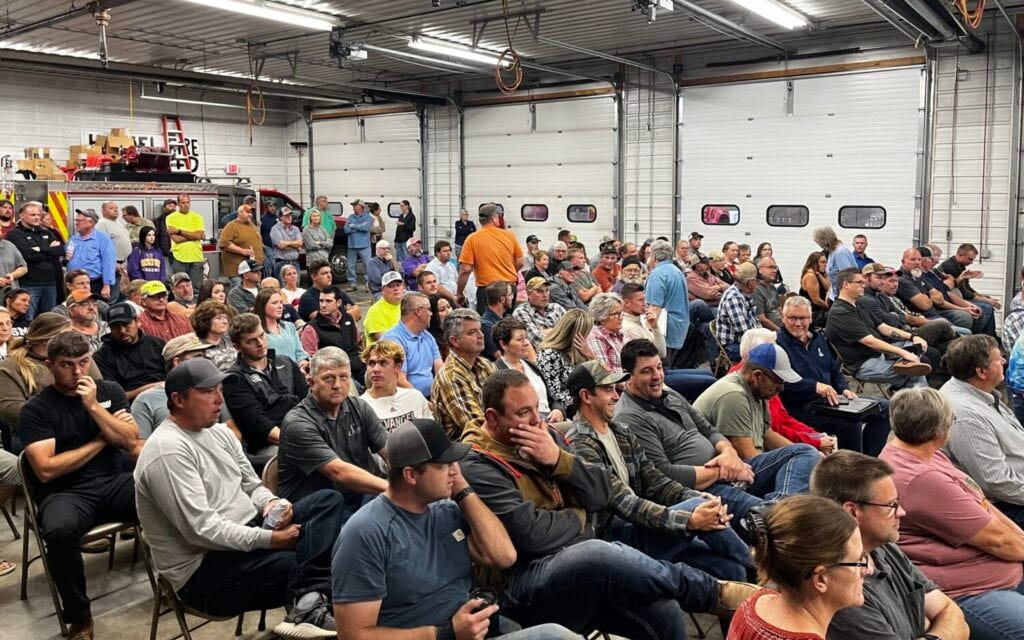 Attendees fill the firehouse in Hazel on Oct. 3, 2023, during a public information meeting about a proposed 12,500-cow dairy. (Joshua Haiar/South Dakota Searchlight)