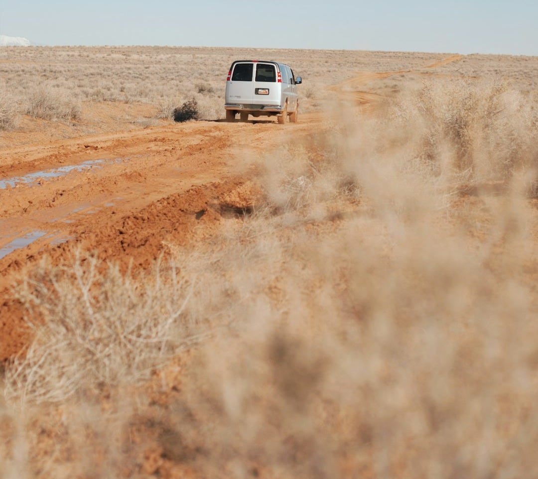silver van on road silver van on road