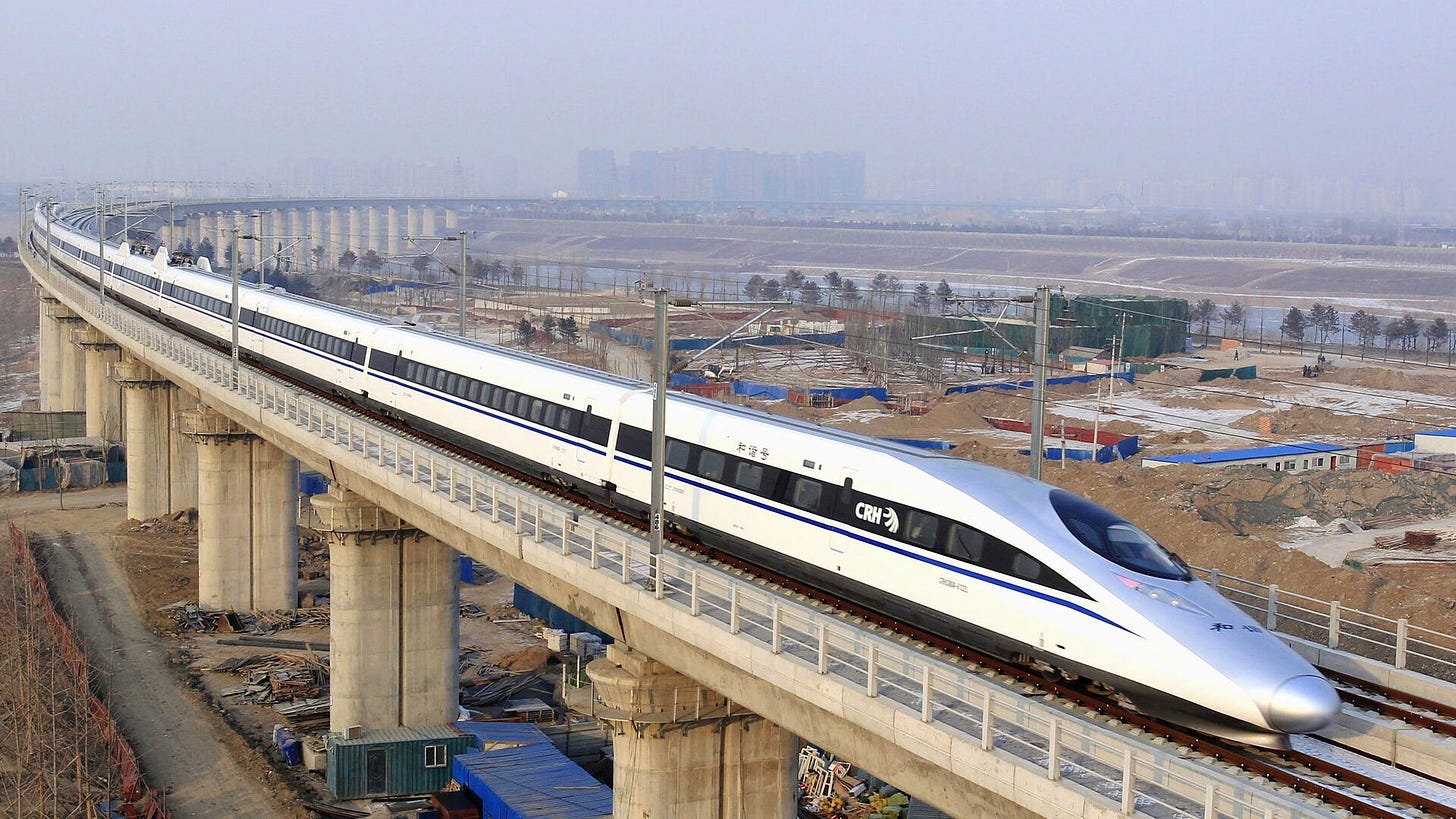 In this photo released by China's Xinhua news agency, a bullet train passes over Yongdinghe Bridge in Beijing Wednesday, Dec. 26, 2012 - Sputnik International, 1920, 20.11.2024