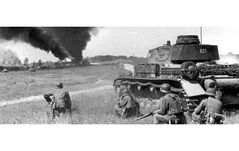 "1941 Ukraine, Battle of Uman, German soldiers at the shelter behind a chariot observe a village on fire" https://www.pinterest.com/pin/475340935665977006/