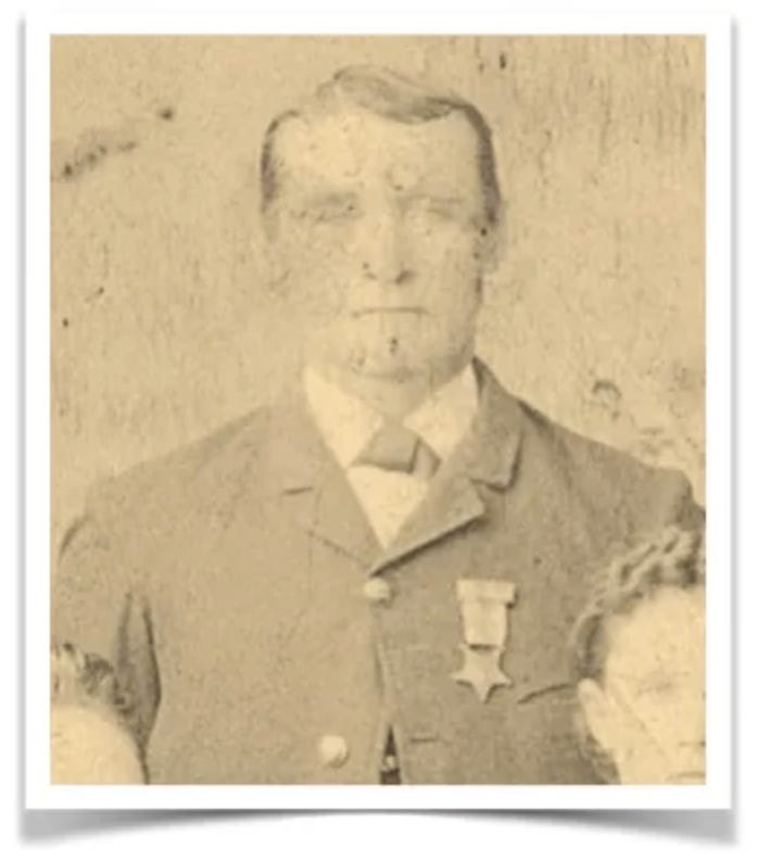 A blurry photo of a Civil War-era soldier with a medal on his left jacket pocket. A blurry photo of a Civil War-era soldier with a medal on his left jacket pocket.