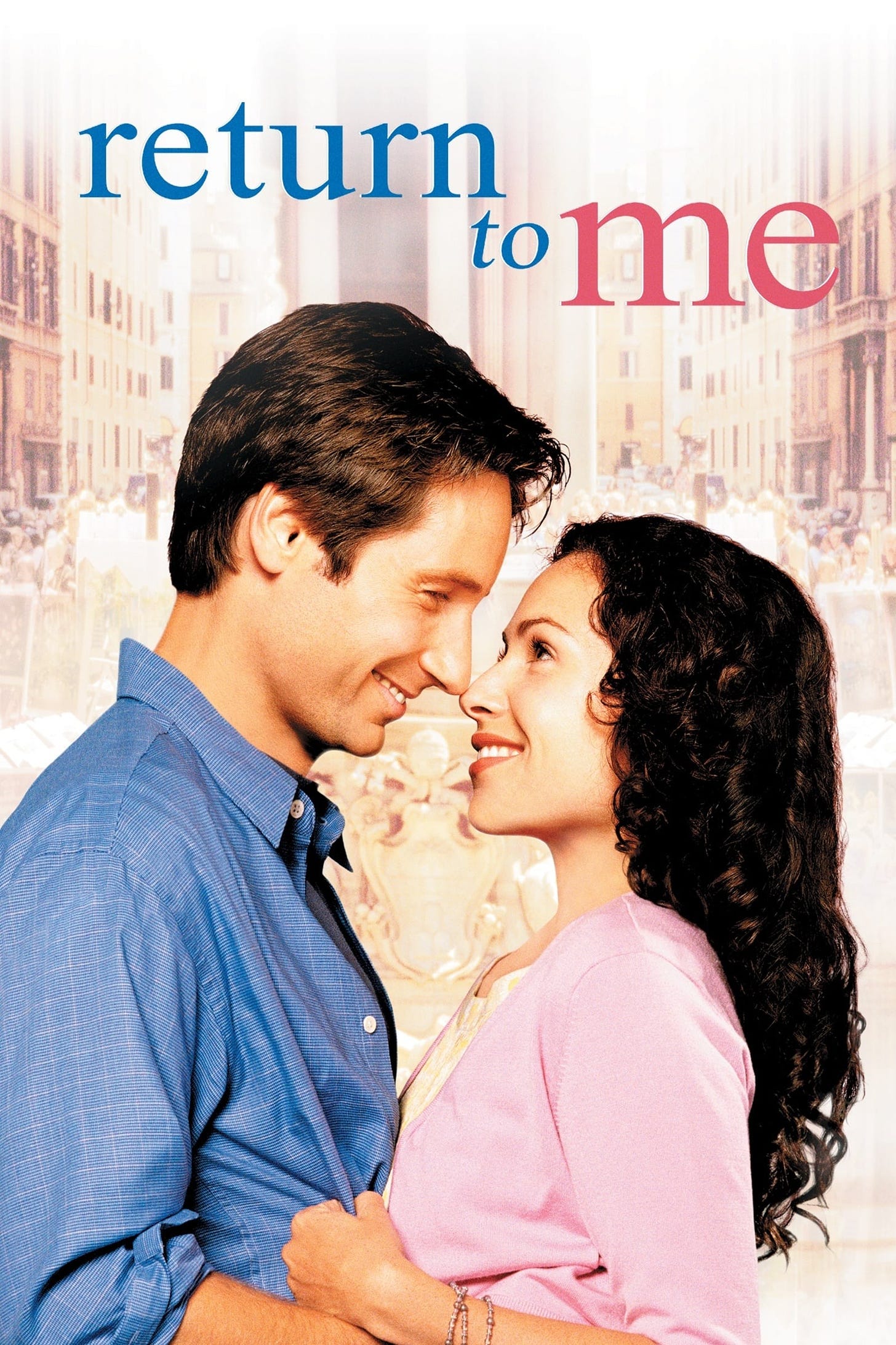 The cover of Return to Me, with David Duchovny and Minnie Driver gazing lovingly into each other's eyes