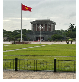 A flag on a flagpole in front of a building
Description automatically generated A flag on a flagpole in front of a building
Description automatically generated