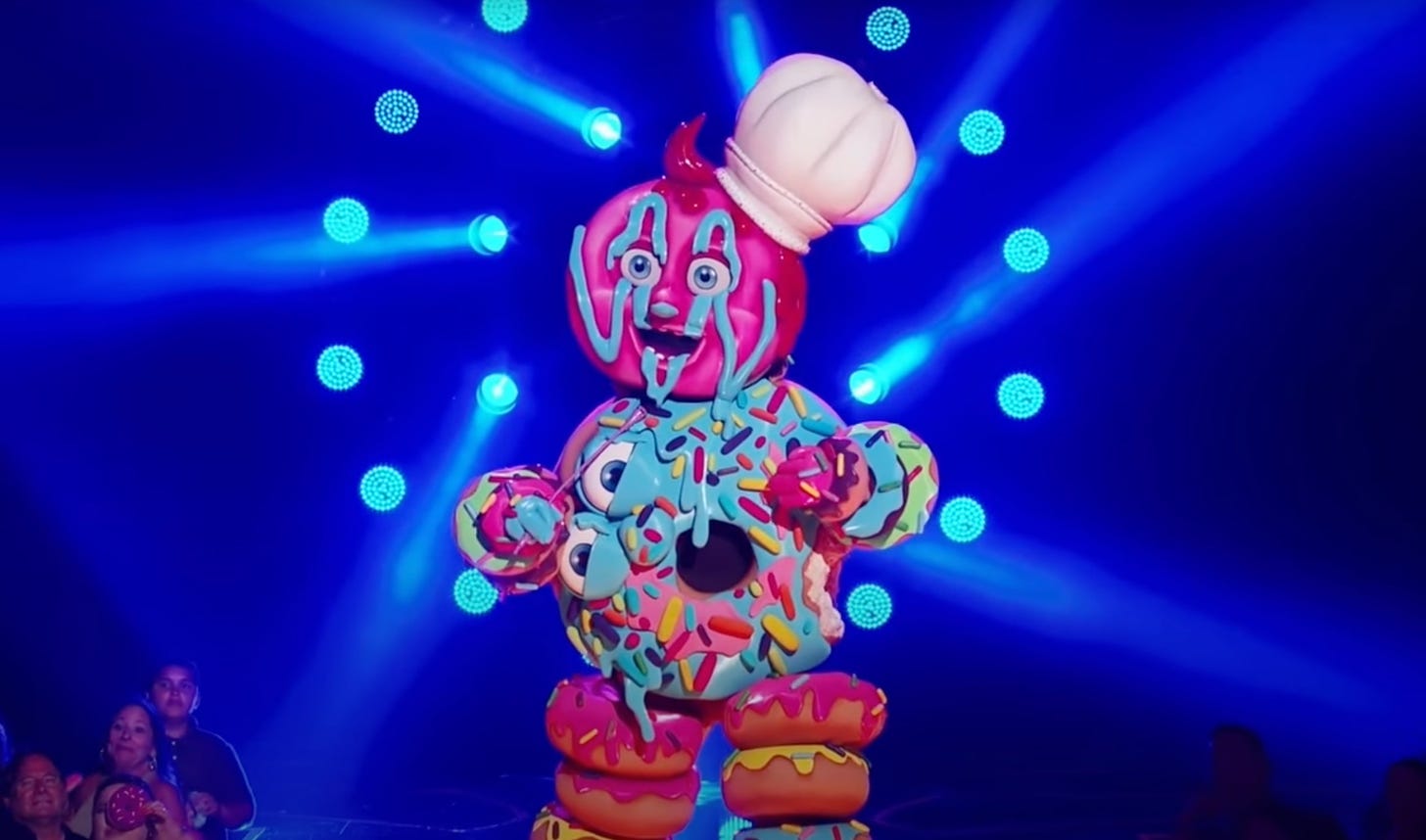 Screenshot of the scary donut man costume from 'The Masked Singer'
