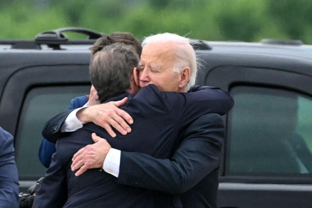 President Biden hugging his son, Hunter, after he was convicted. Joe  promised not to pardon him. : r/pics