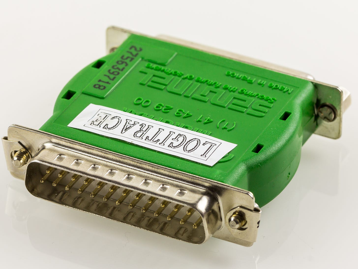 https://upload.wikimedia.org/wikipedia/commons/0/09/Dongle_Sentinel_Microphar_for_Logitrace-5959.jpg Your basic dongle. A parallel port connector, sometimes used for connecting a desktop computer to a printer. Raimond Spekking / CC BY-SA 4.0 (via Wikimedia Commons)