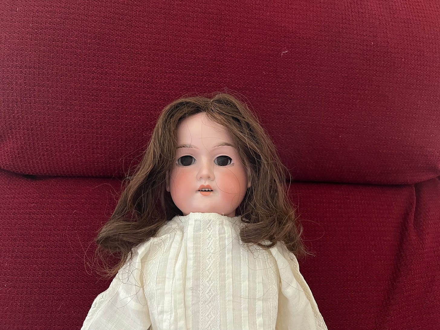Photo of the top of a porcelain doll