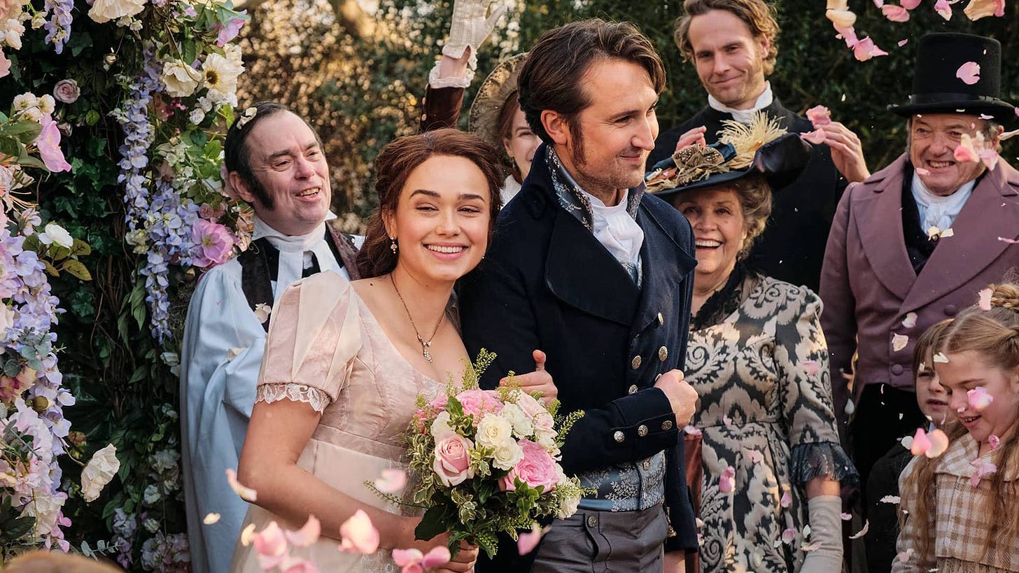 Rose Williams as Charlotte Heywood (left) and Ben Lloyd-Hughes as Alexander Colbourne (right) surrounded by well-wishers at their wedding in the SANDITON finale.