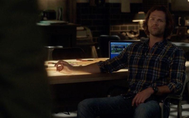 sam winchester sitting at table supernatural