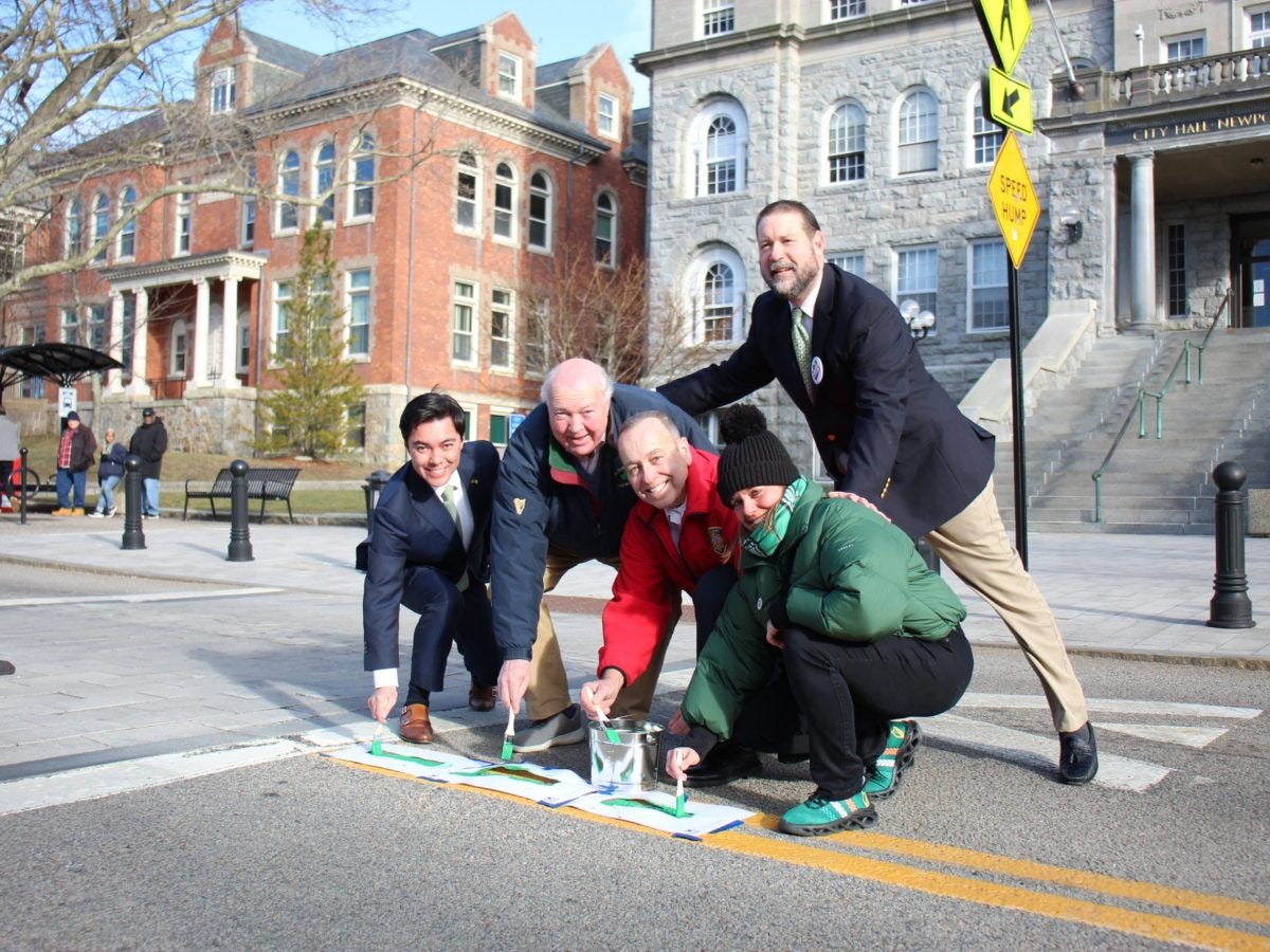 City of Newport stripes Broadway, Thames Street green in honor of St. Patrick’s Day