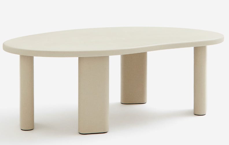 asymmetric cream coffee table