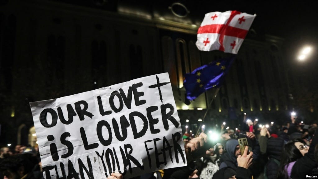 Supporters of Georgia's opposition parties hold a rally to protest against the government's decision to suspend talks on joining the European Union, in Tbilisi, Georgia December 8, 2024.