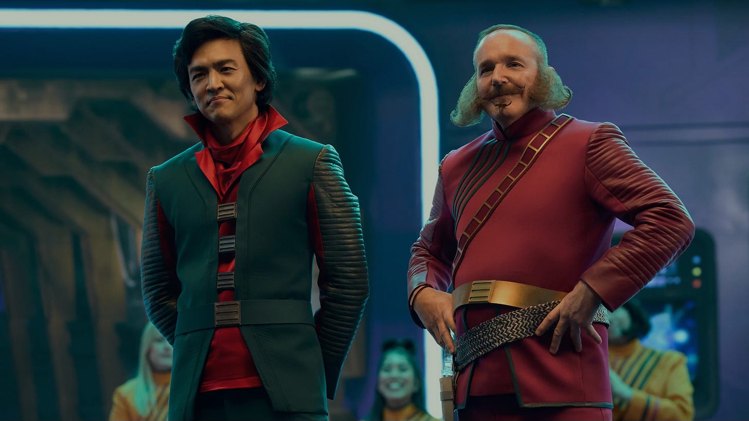 John Cho and Clark Gregg as actors in the show-within-a-show “The Rise & Fall of Sanctuary Moon” on Murderbot