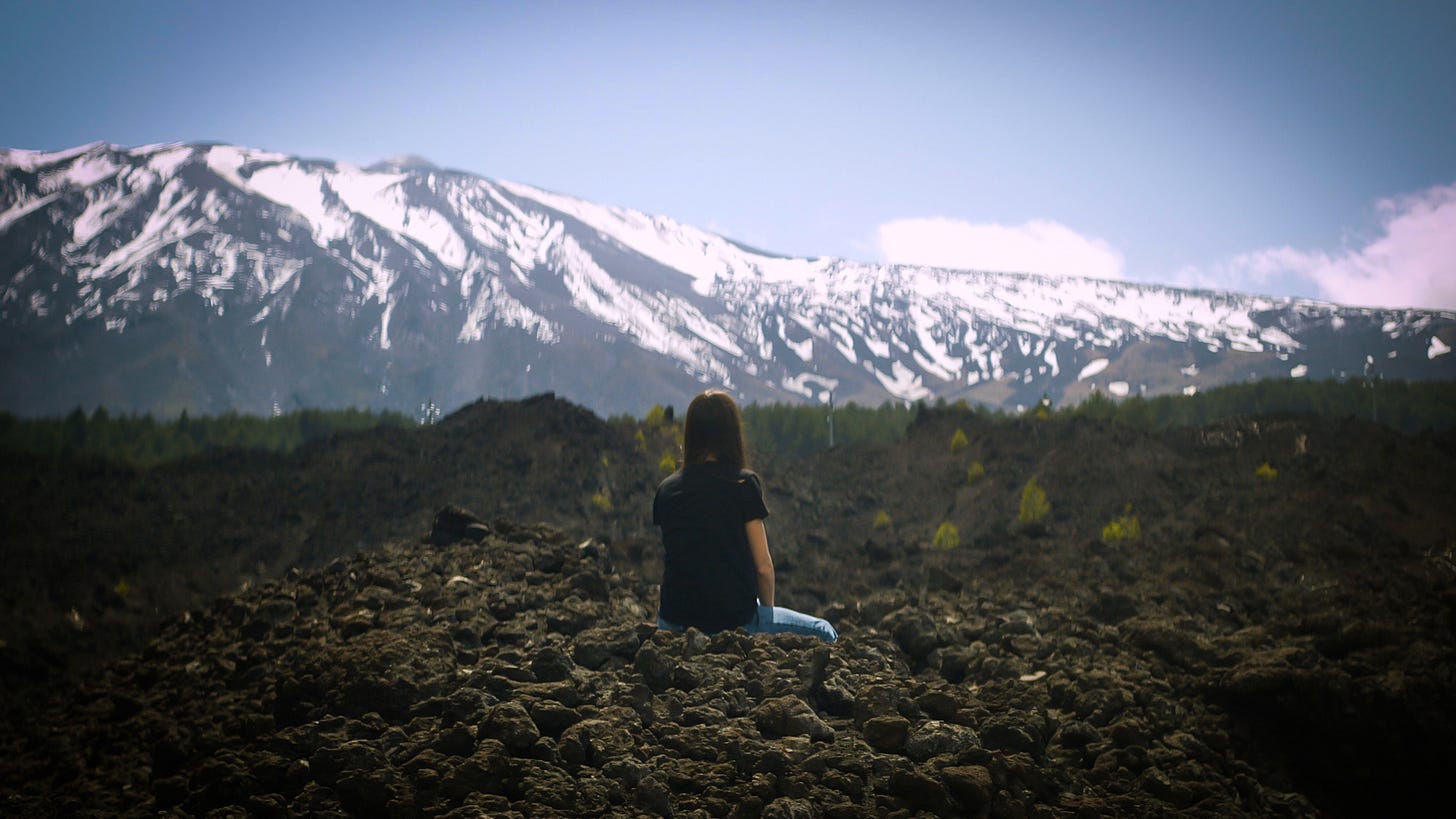 Woman at the foot of Mount Etna