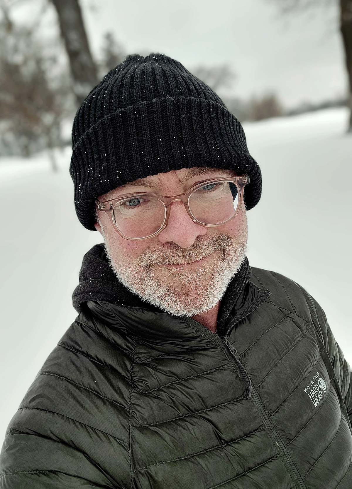 Hank Shaw walking in the snow. 