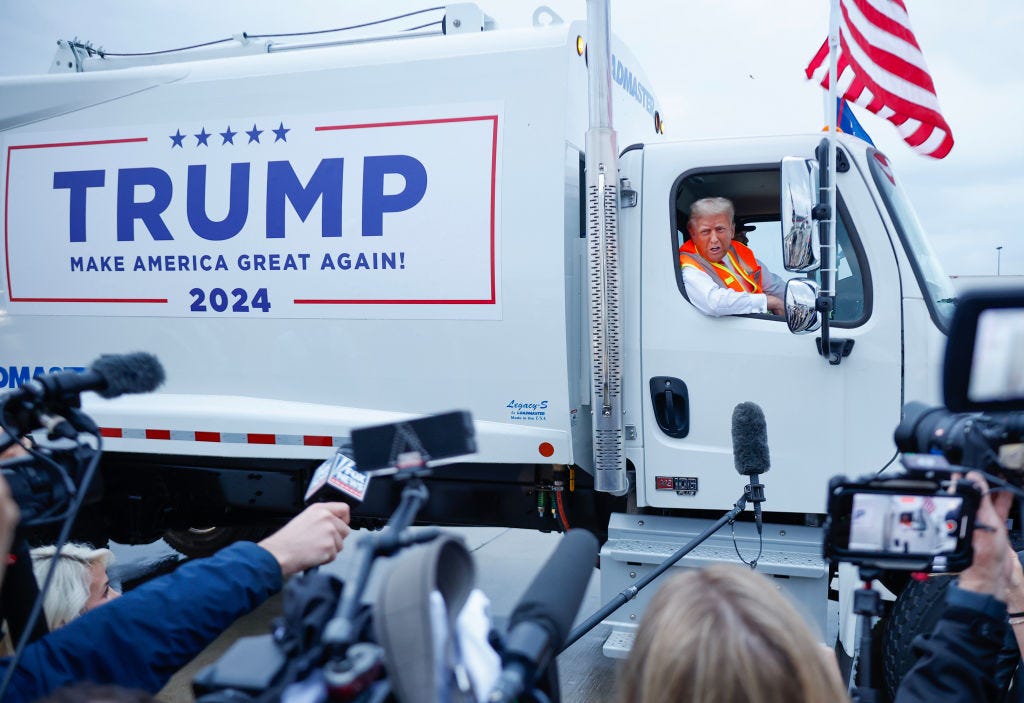 Donald Trump climbs into garbage truck in stunt to call out Biden, Harris -  National | Globalnews.ca