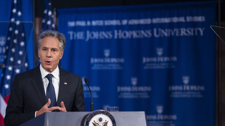 May be an image of 1 person, microphone and text May be an image of 1 person, microphone and text