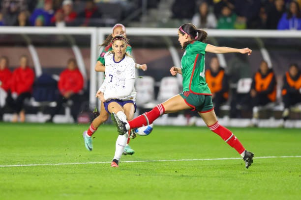 Alex Morgan of the United States gets a shot blocked by Itzel González of Mexico at Dignity Health Sports Park on February 26, 2024 in Carson,...