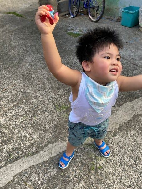 Happy toddler because he can have unlimited play or Unli Dapa