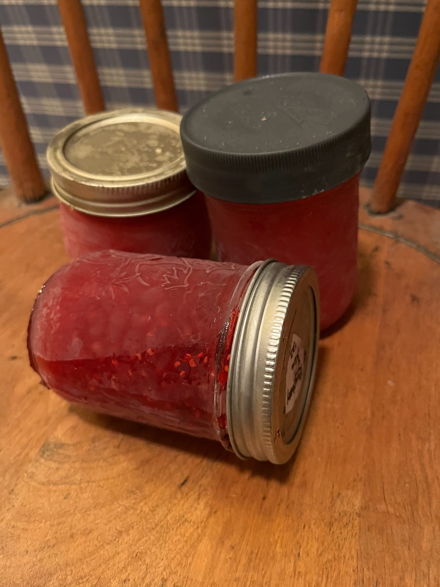 Three jars of a raspberry jam