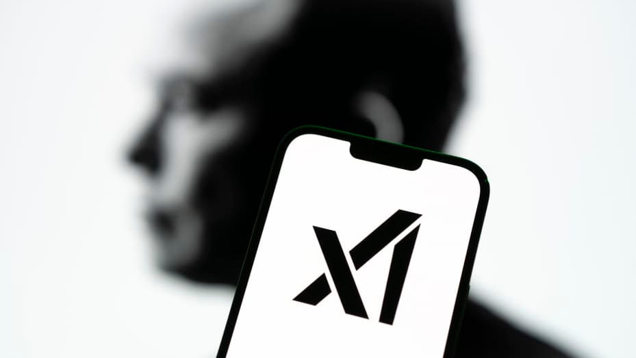 The xAI logo is seen on a mobile device in this photo illustration on 13 July, 2023 in Warsaw, Poland. On Wednesday Elon Musk announced his new company xAI which he says has the goal to understand the true nature of the universe. (Photo by Jaap Arriens/NurPhoto via Getty Images)