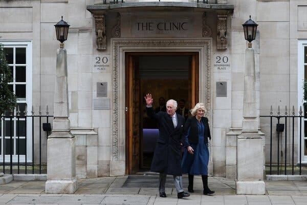 King Charles and Queen Camilla departing a medical facility.