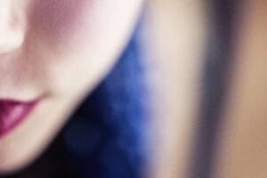 Closeup of a woman's cheek and lips