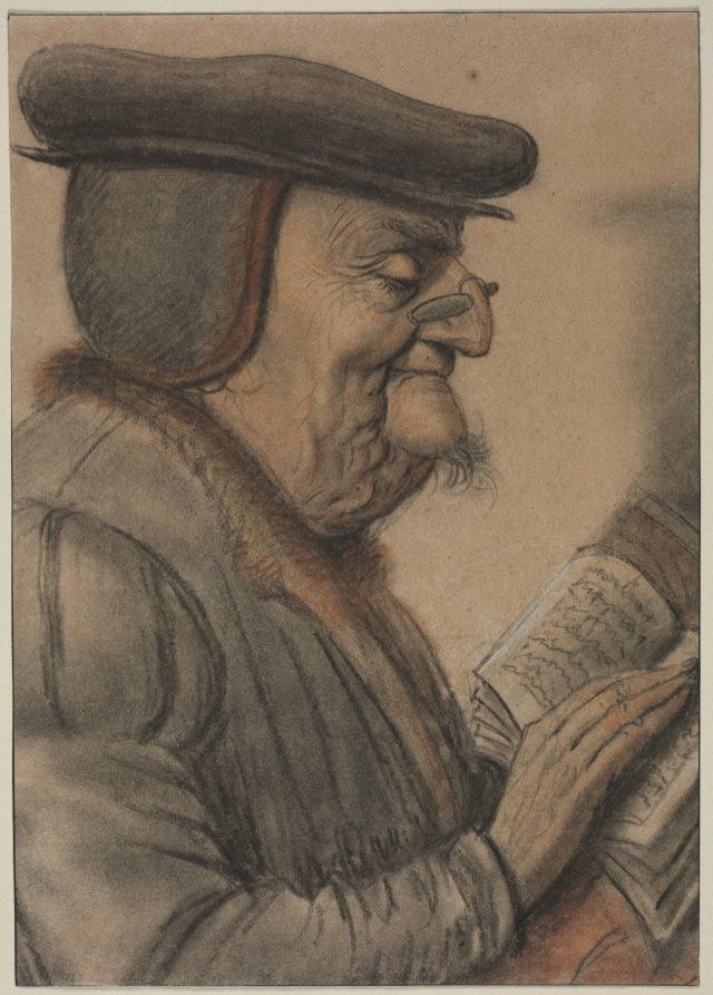 Elderly Man Reading a Book