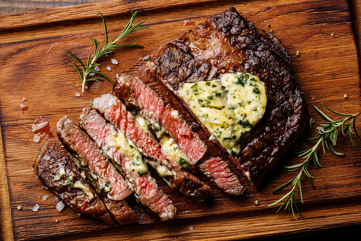 Grilled Rubbed Ribeye Steak with Garlic Steakhouse Butter (2022 ...