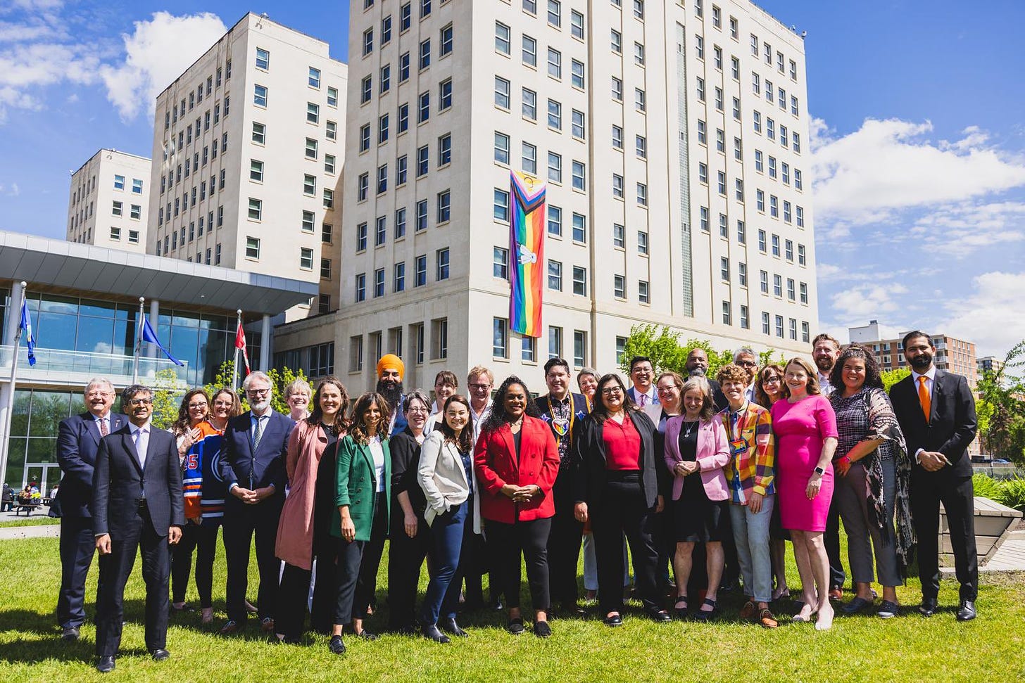 Sarah and her Alberta NDP colleagues at the pride flag drop.