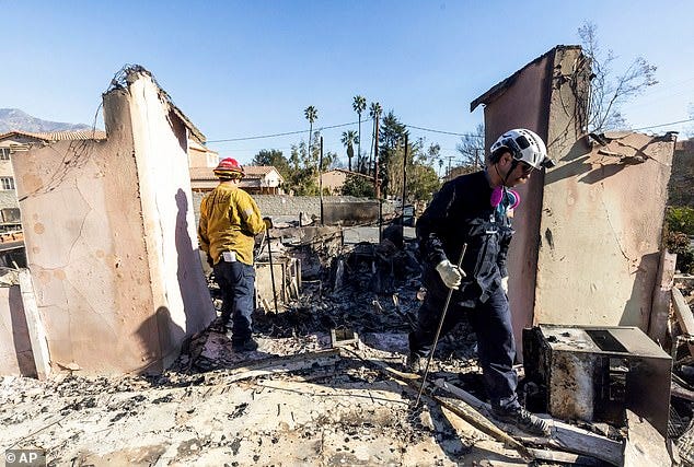 Search and Rescue crews work the devastation zone in the aftermath of the Eaton Fire Sunday, Jan. 12, 2025 in Altadena, California