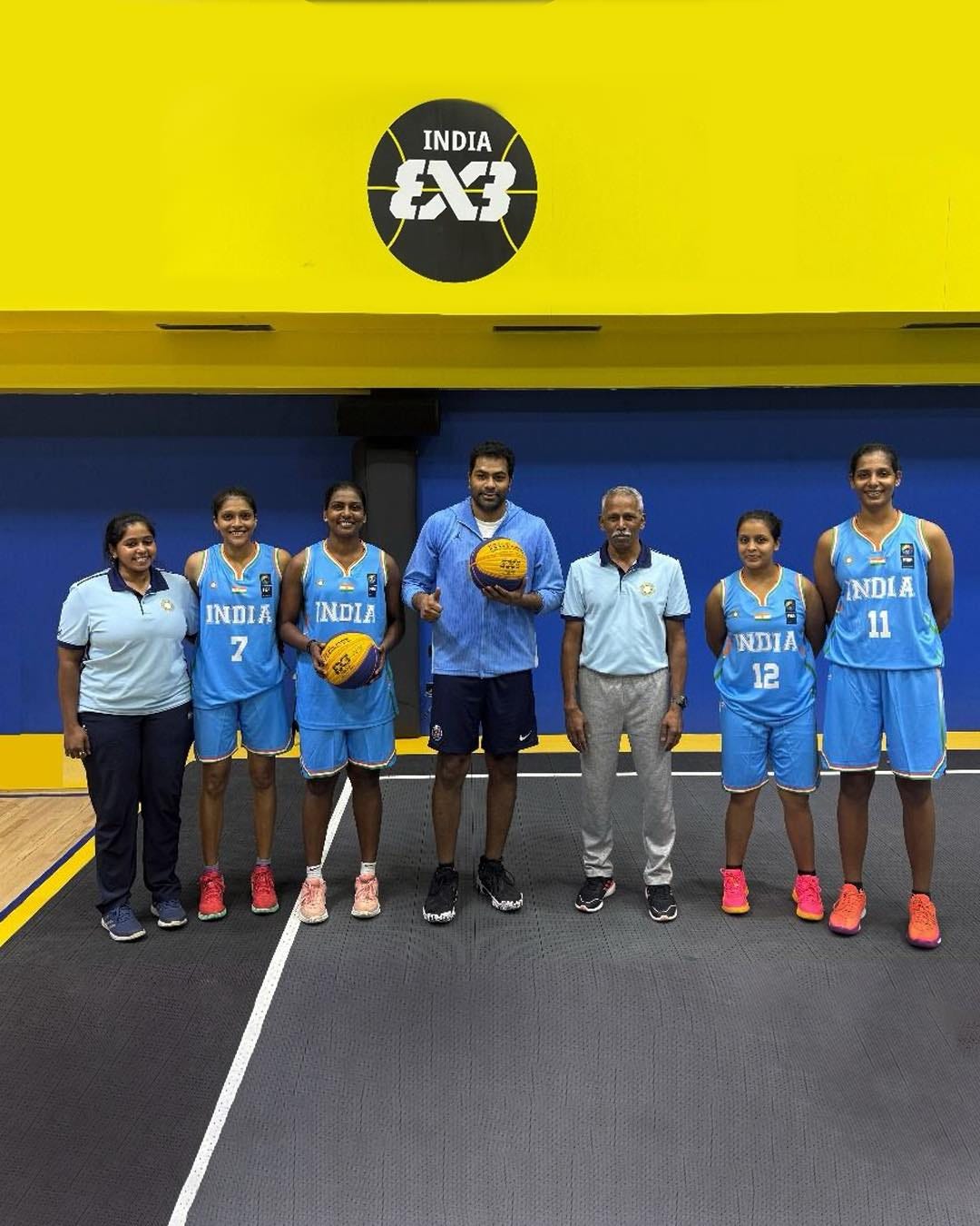 May be an image of ‎7 people, people playing basketball, basketball jersey and ‎text that says '‎INDIA INDIA EX3 INDIAINDIA INDIA INDIA 7 9 INDIA 11 NDIA ΝΣΙΑ 12 של ภหภ‎'‎‎