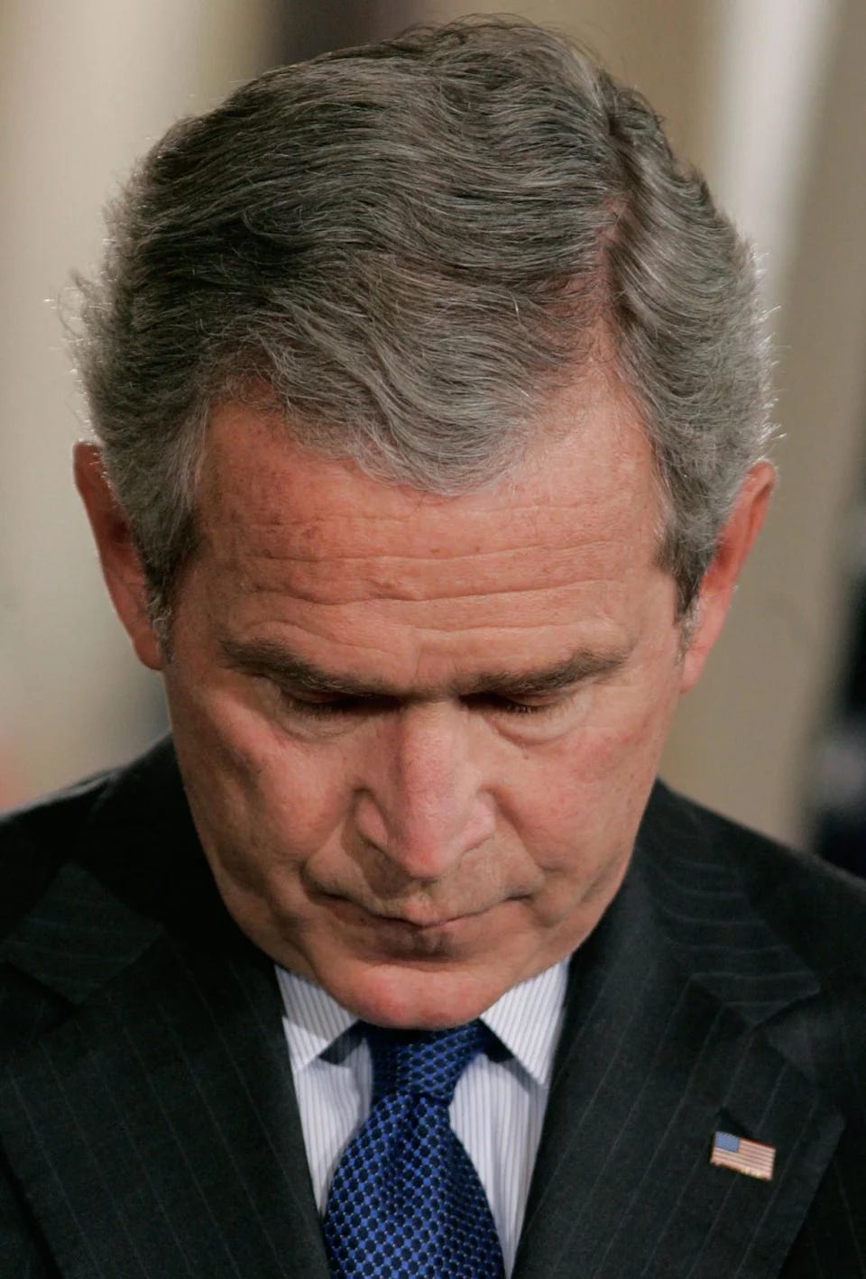 WASHINGTON - JULY 28:  U.S. President George W. Bush listens to a question from a reporter during a news conference with British Prime Minister Tony Blair in the East Room at the White House July 28, 2006 in Washington, DC. The two leaders talked about the current  mid-east situation and the war in Iraq.  (Photo by Mark Wilson/Getty Images)