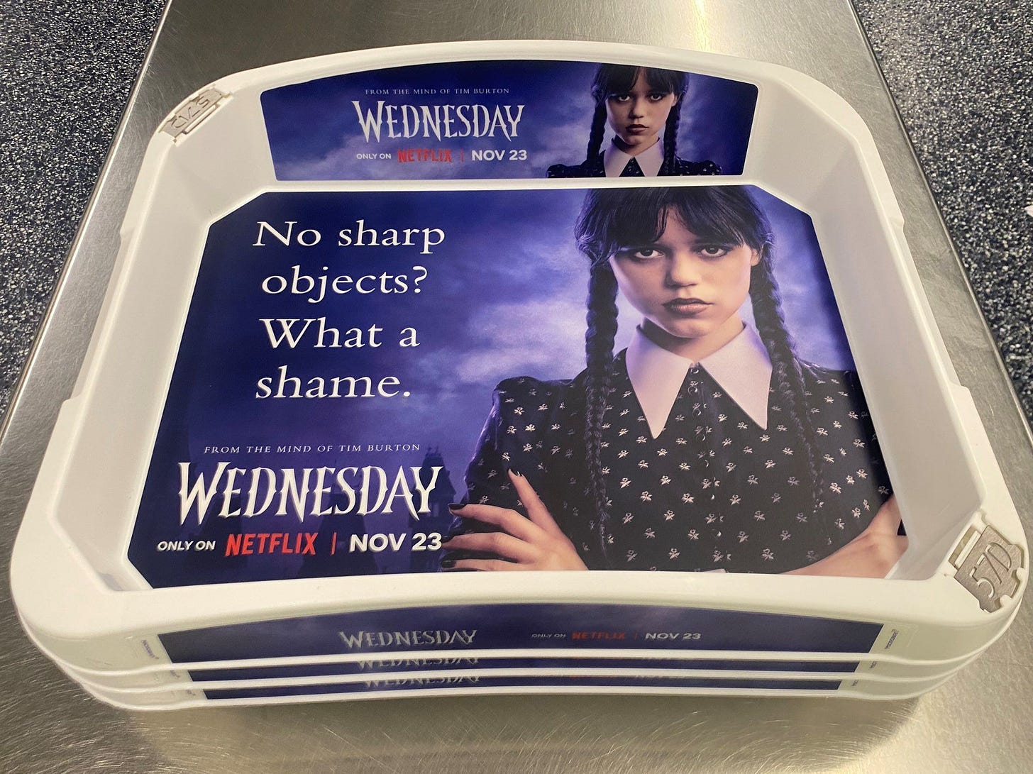 Hollywood Horror Museum on X: "Absolutely freaking brilliant way to sell  WEDNESDAY, putting this on Airport Security trays. https://t.co/mRzDnOFXRk"  / X