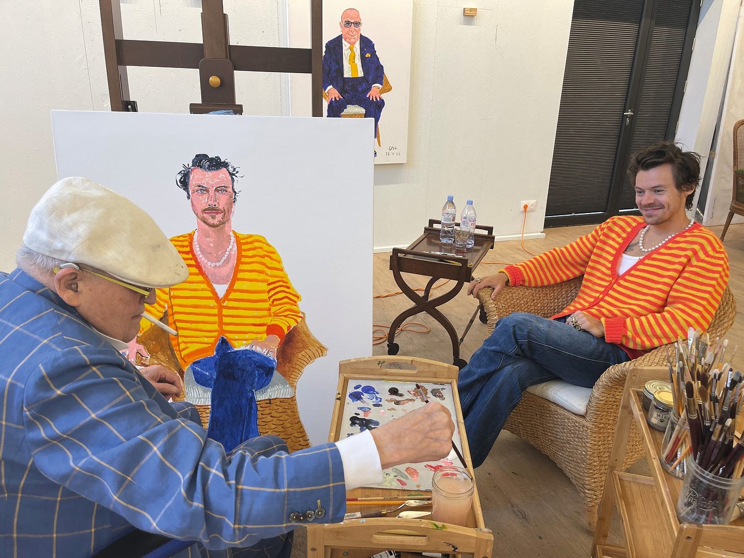 Hockney paints Harry Styles at the artists studio in Normandy where his portrait of Clive Davis can also be seen in the...