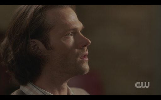 Sam Winchester looking at Mrs Butters powerless.