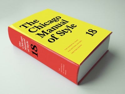 Color image of The Chicago Manual of Style, 18th edition, showing the yellow panel of the front of the dust jacket and the warm red spine.