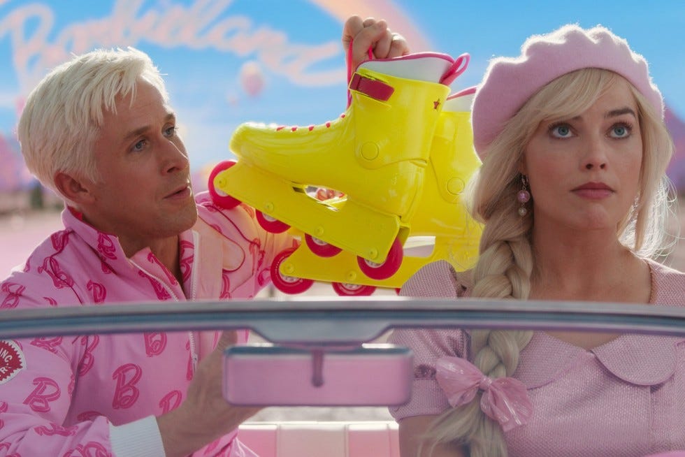 Margot Robbie and Ryan Gosling in Barbie, with Gosling holding a bright yellow pair of roller skates