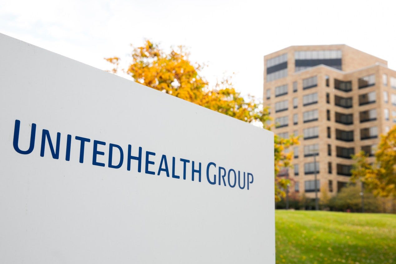 A photo of the UnitedHealth Group logo in front of its headquarters.