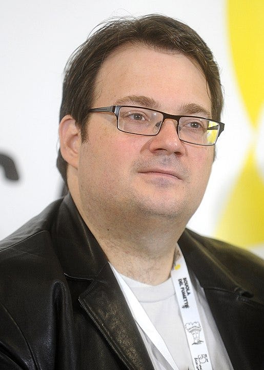 Link takes you to the WikiCommons page for this photo of Brandon Sanderson from 2016.