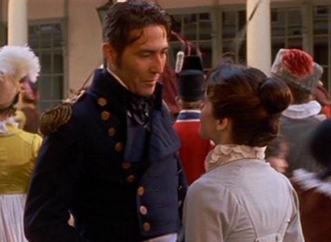 Anne and Captain Wentworth talking to each other.