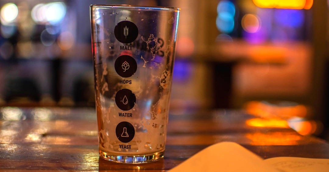 a close up of a glass on a table