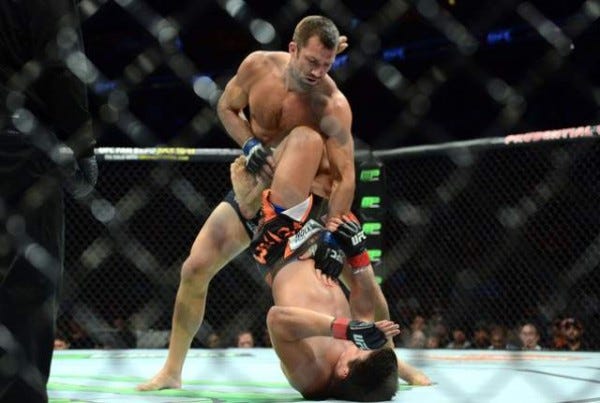 luke rockhold turns lyoto machida upside down for ufc fight night 2015